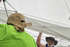 Holding down canopy